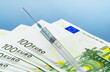 100 euro bills with vaccine syringe on blue background, 3D render