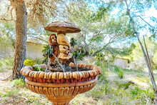 Gnomes Under The Mushroom, Fountain With Splashing Water Outdoors