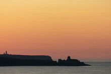 Fort La Latte Near Saint Cast Le Guildo  On Brittany Coast From The Sea Or With Sunset