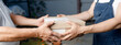© Кирилл Горшков - delivery postman handing a parcel box to the recipient, accepting a parcel from a cardboard box from a postal item, the concept of a home courier and a delivery service