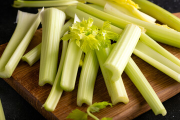 Wall Mural - Bunch of fresh celery stalk with leaves. Healthy vegetarian food