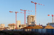 © hassan bensliman - Cranes and construction in Paris suburb. Ivry-sur-Seine city