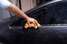 Manual Car Window Cleaning With Soap And Water Outdoors. Graphic Resource.