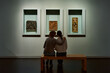 © JENOCHE - mother and daughter looking at expositions of previous centuries in museum