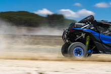 Blue Buggy Racing  On Dirt Track - Extreme Sport