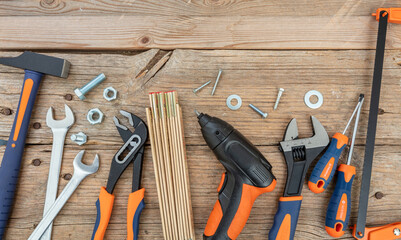 Wall Mural - Work tool repair service hardware on wood, overhead. DIY, home maintenance, handyman