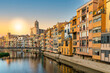 view of the city of Girona in the historic center with the cathedral in Catalonia in Spain at sunset