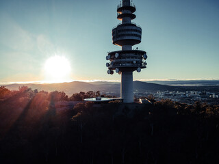 Wall Mural - The Telstra Tower surrounded by trees under the sunlight in Canberra, Australia