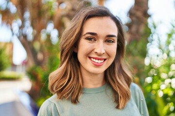 Canvas Print - Young woman smiling confident standing at park