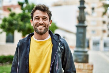 Sticker - Handsome hispanic man with beard smiling happy outdoors