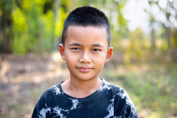 close-up asian boy portrait at park