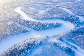 Wall Mural - Winter landscape. Aerial view. Landscape with winding river and snowy forest in Western Siberia. Agan River, Yugra