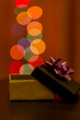 Open gift package with round shaped bokeh lights