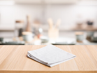 Wall Mural - Fabric,cloth on wood table top on blur kitchen counter (room)background