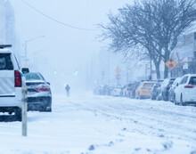 City Bad Weather, Snow Storm In City Streets, Cars Covered By Snow, Heavy Snow Fall.