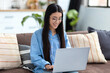 © kucherav - Smiling woman, laptop, online learning, education, shopping, social