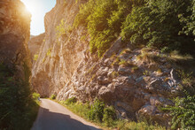 Narrow Road Pass Between Rocky Cliffs