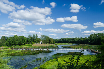 Poster - Lots of people cross the Venta waterfall - the widest waterfall in Europe, Kuldiga, Latvia