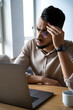 © Stock 4 You - Portrait of serious puzzled man looking at laptop screen sitting in office