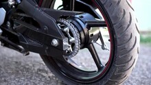 Close Up Of A Motorcycle's Rear Wheel 