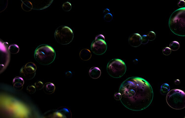 Poster - A closeup of bubble blowers with a black background