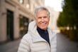 © Westend61 - Smiling senior man in the city
