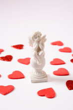 Angel Statue In Red Heart. Love Concept.