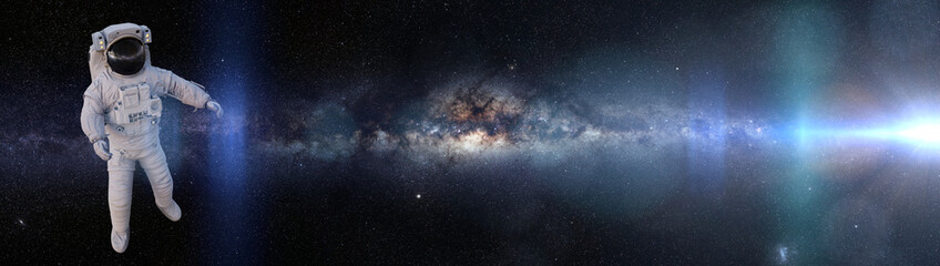Wall Mural - astronaut in outer space, background banner