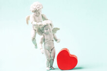 Angels Baby And Red Heart On Blue Background. White Little Cupids Flying In Sky, Retro Style