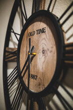 Closeup Of An Old Time Clock On A Wall