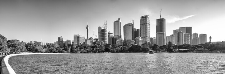 Wall Mural - Panoramic sunset view of Sydney Harbour and Downtown skyscrapers, Australia.