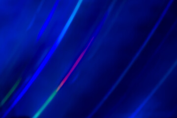 blue rainbow abstract background from the sun shines on the silicon wafer.