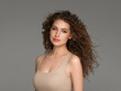 Curly hair woman beautiful beauty portrait, female glamour face with long brunette hairstyle