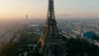 Aerial view of Paris Cityscape with Eiffel Tower as main Landmark Monument and Cultural Icon of Capital of France and Famous Touristic Destination. Travel and Urban Skyline Panorama. 4K drone shot