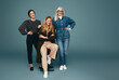 © Jacob Lund - Group of three happy women smiling cheerfully