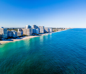 Wall Mural - aerial drone of City of Fort Lauderdale, Florida with empty space. City on beach with ocean and clear blue sky