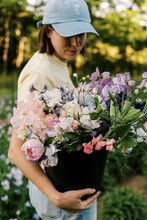 Young Female Entrepreneur Working On Her Flower Farm