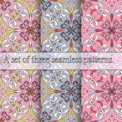 A set of three light patterns in oriental style. Lace decorative elements of curls and twigs, floral damask print.