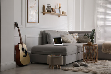 Sticker - Living room with comfortable grey sofa and stylish interior elements