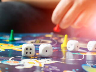 board games concept. Dice, chips and cards on the background of the playing field copy space