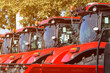 Agricultural tractors aligned outdoor