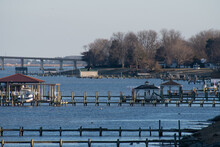 Winter View Of The Rappahannock River, Docks, Geese And The Downing Bridge Connecting The Middle Peninsula To The Northern Neck In Tappahannock Virginia, USA