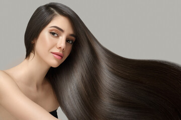 Fashion woman with straight long shiny hair. Beauty and hair care