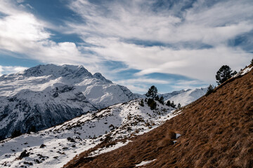 Wall Mural - Snowy Greater Caucasus ridge. Sunny day. Before suset. View from 3500m