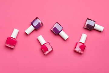 Wall Mural - Set of nail polish bottles on color background