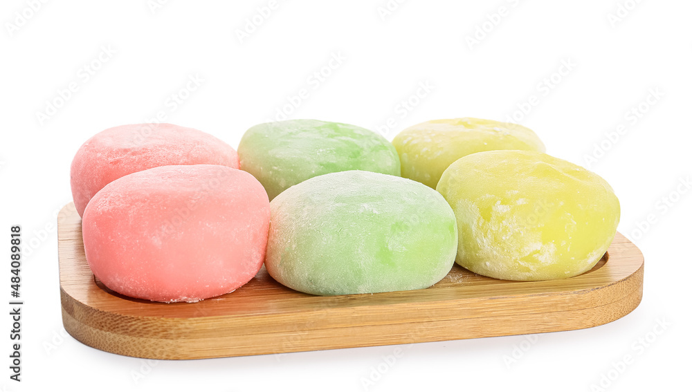 Board with delicious mochi on white background