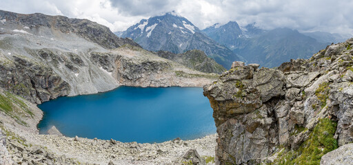 Wall Mural - Panoramic view of the lake in the mountains.