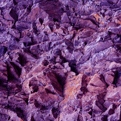 Wall Mural - purple pink lilac orange stone texture. mountains surface. close-up. crushed stone background with s