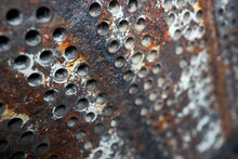 Tube Sheet Or Plate Of Heat Exchanger Boiler Closeup Texture Selective Focus Background Opened For Inspection Maintenance Or Cleaning From Insoluble Hard Mineral Deposits Salts Scale And Corrosion.