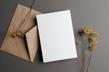 Wedding invitation or greeting card mockup with dry twigs and envelope